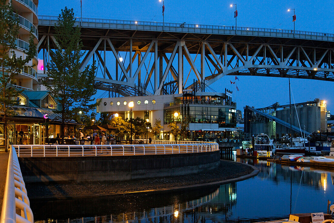 Promande and small Marina at False Creek at twilight, Granville Bridge, Vancouver, Canada, North America