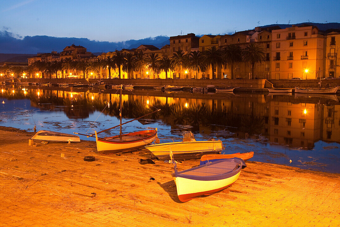 Boats, dusk, view at the city houses, river Fiume Temo,  Bosa, Sardinia, Italy, Europe