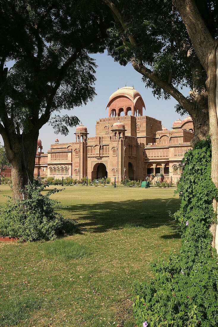 View of the Laxmi Niwas Palace framed by trees, Bikaner, Rajasthan, India