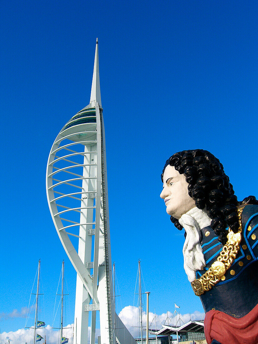 Spinnaker Tower and figurehead at Gun Wharf, Portsmouth, Hampshire, UK, England