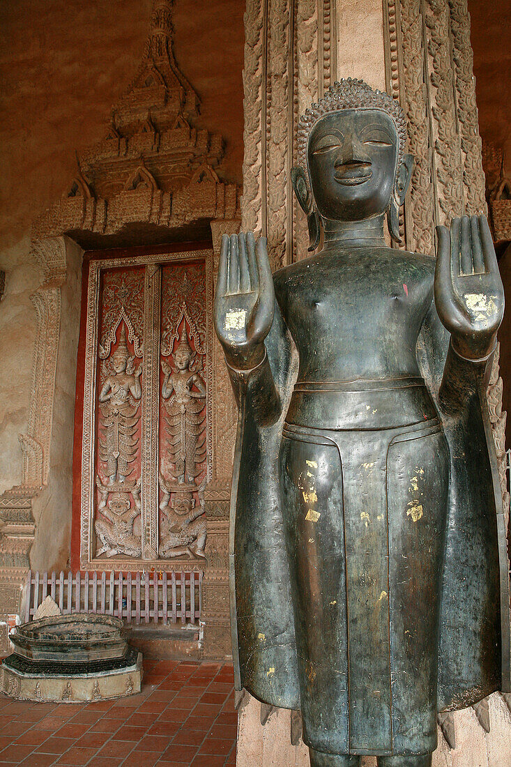 Bronze Buddha statue at Haw Pha Kaew, Vientiane, Laos