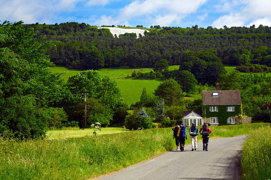 The White Horse and group of walkers, Kilburn, Yorkshire, UK, England