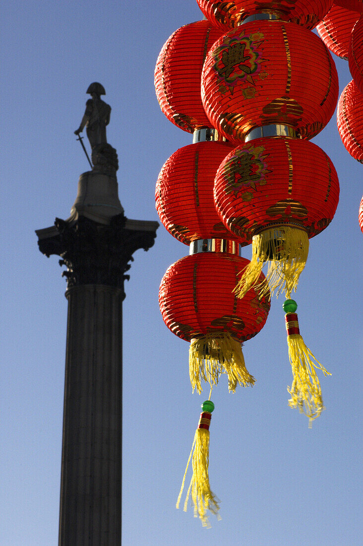Chinese New Year, red lanterns and Nelsons Column, London, UK, England