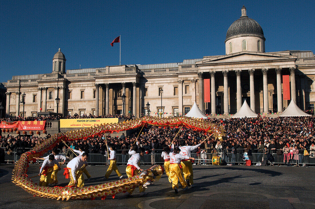 Chinese New Year, dragon dance in front of National Gallery, London, UK, England