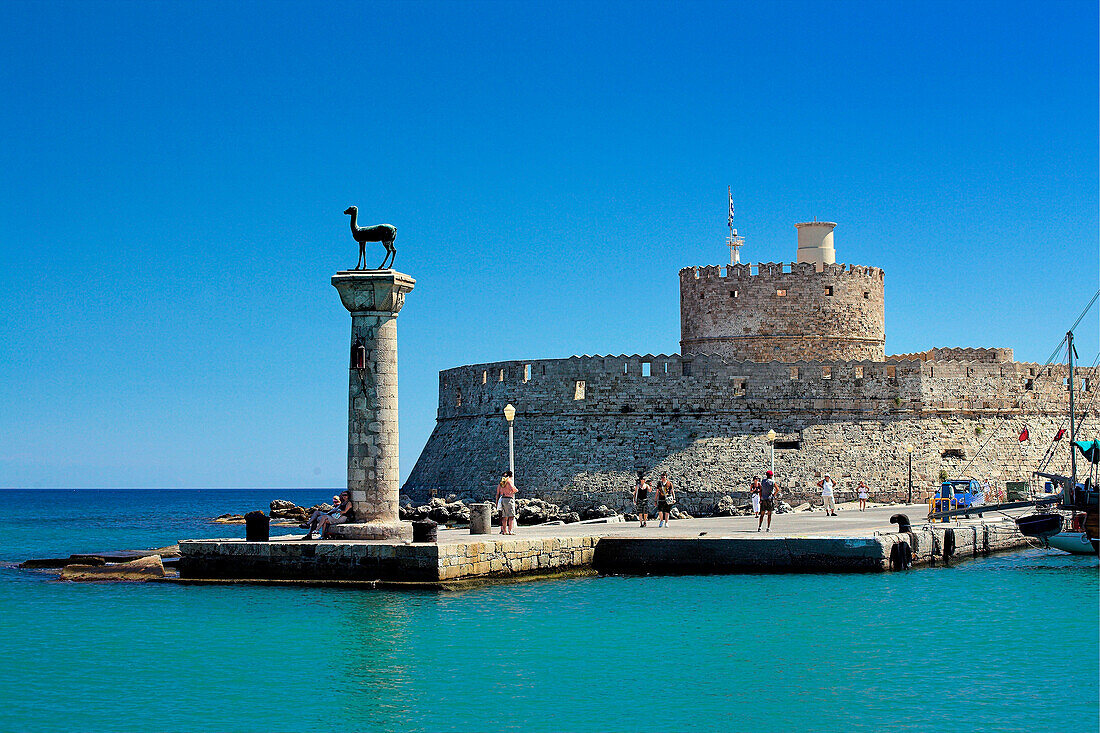Mandraki Harbour with deer statue and St Nicholas Fort, Rhodes Town, Rhodes Island, Greek Islands
