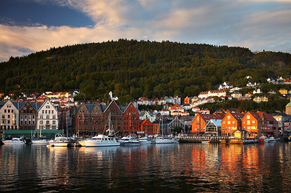 Quayside and harbour at Torget at sunset, Bergen, Hordaland, Norway