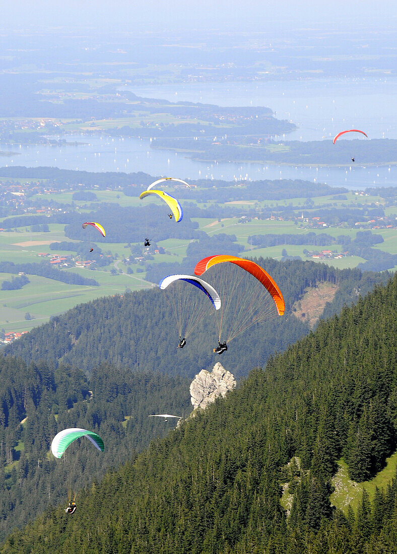 Paragliders at mount Hochries, Chiemgau, Bavaria, Germany