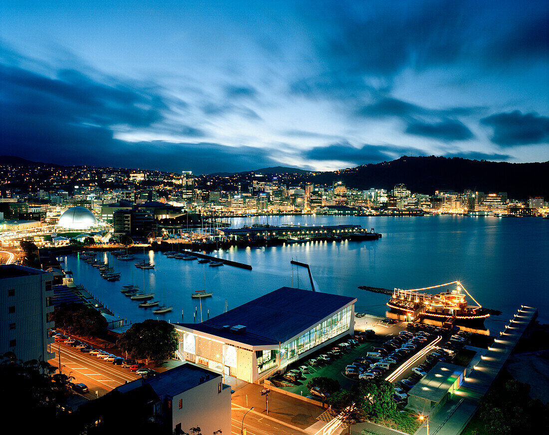 View over the illuminated Lambton Harbour with Clyde Quay Marina in the evening, Wellington, North Island, New Zealand