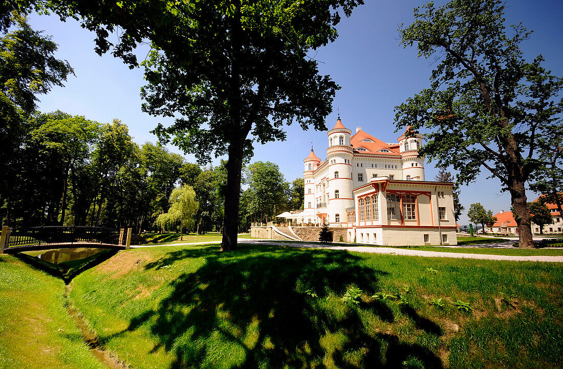 View at hotel Wojanow castle in the sunlight, Lomnica, Bohemian mountains, Lower Silesia, Poland, Europe