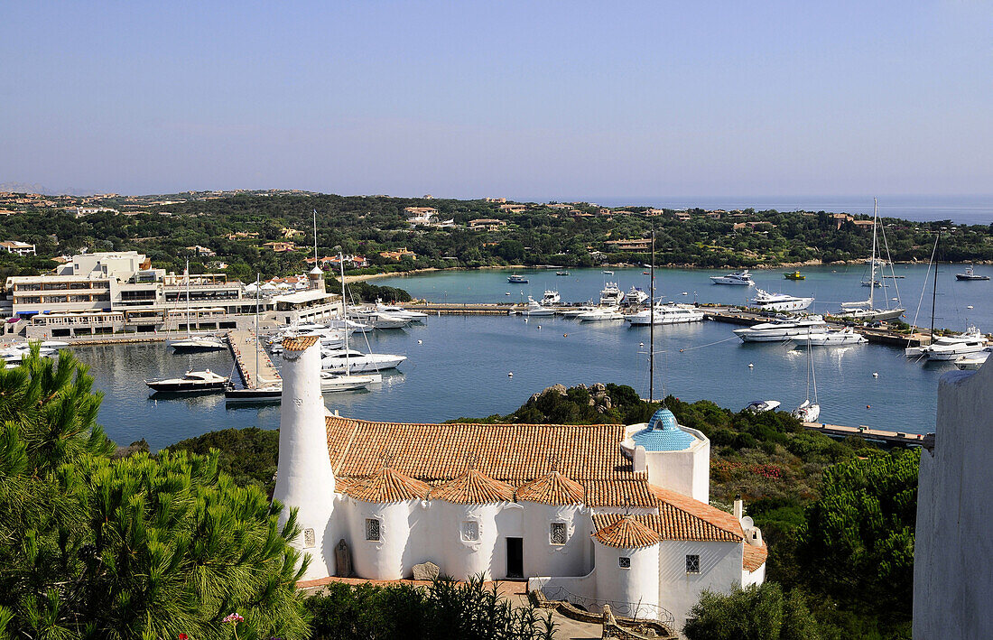 View at the church Santa Maria di Stella Maris and the bay in the sunlight, Porto Cervo, Costa Smeralda, North Sardinia, Italy, Europe