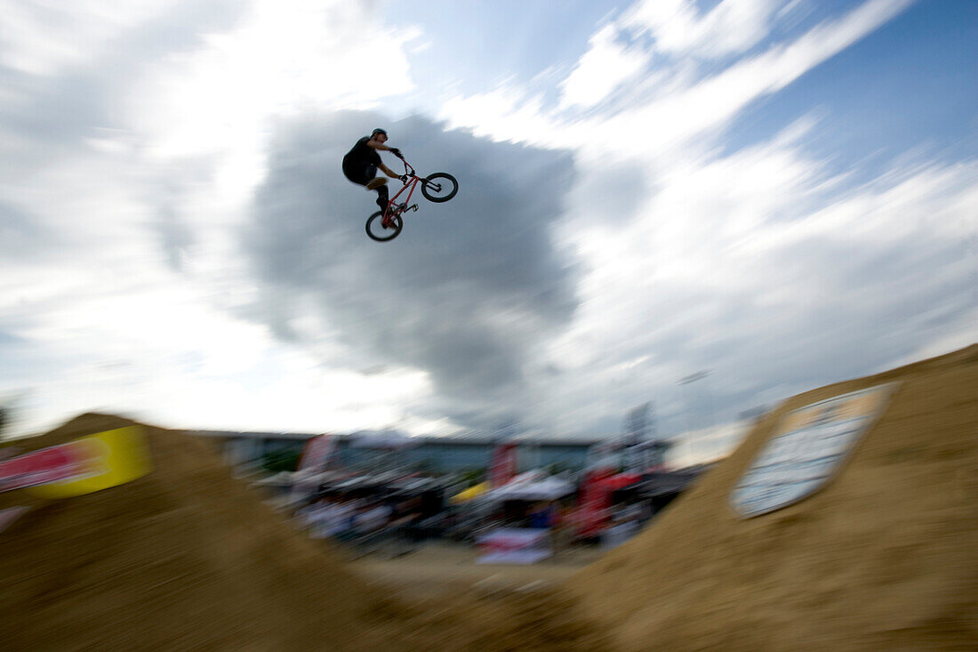 BMX cyclist in mid-air, Munich, Bavaria, Germany