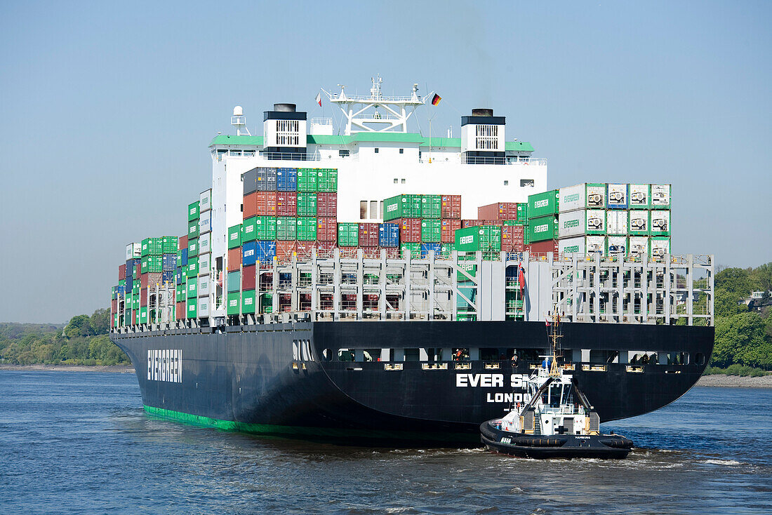 Container ship and tugboat, Port of Hamburg, Germany