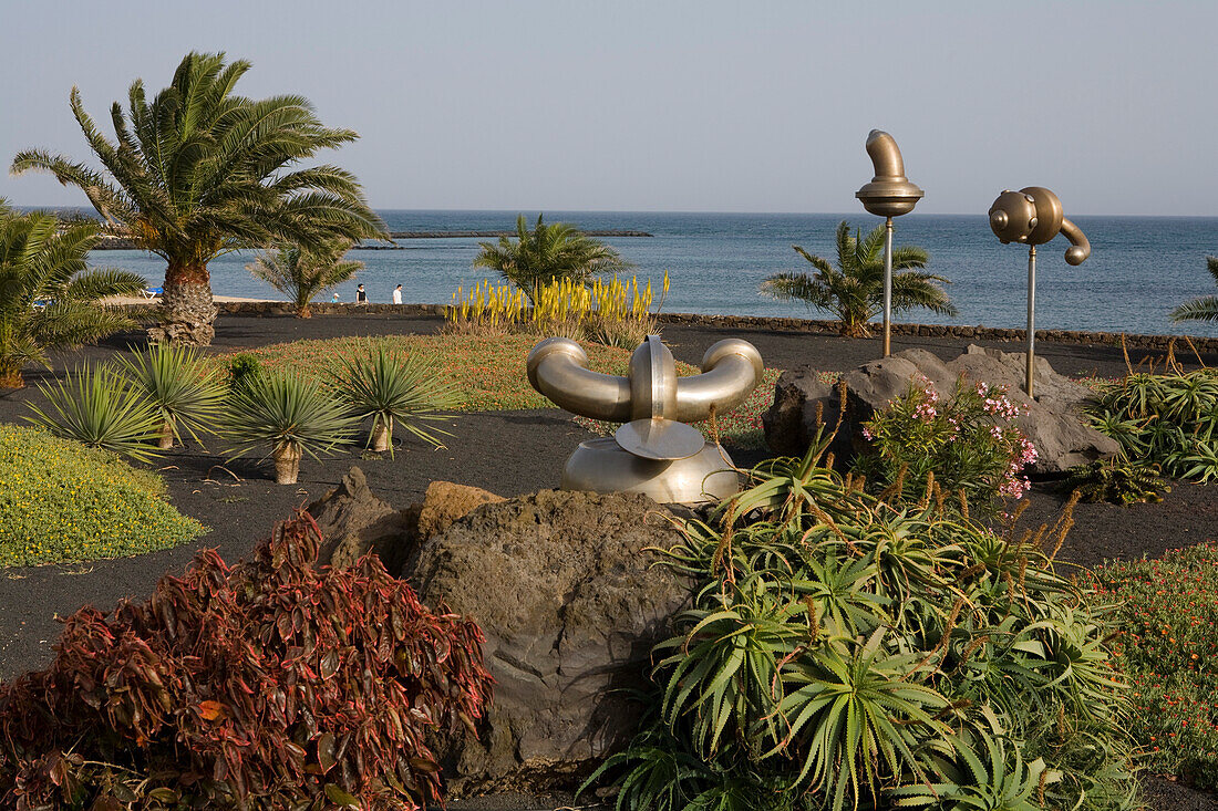 Sculptures along the beach promenade, Playa de las Cucharadas, Costa Teguise, Lanzarote, Canary Islands, Spain, Europe