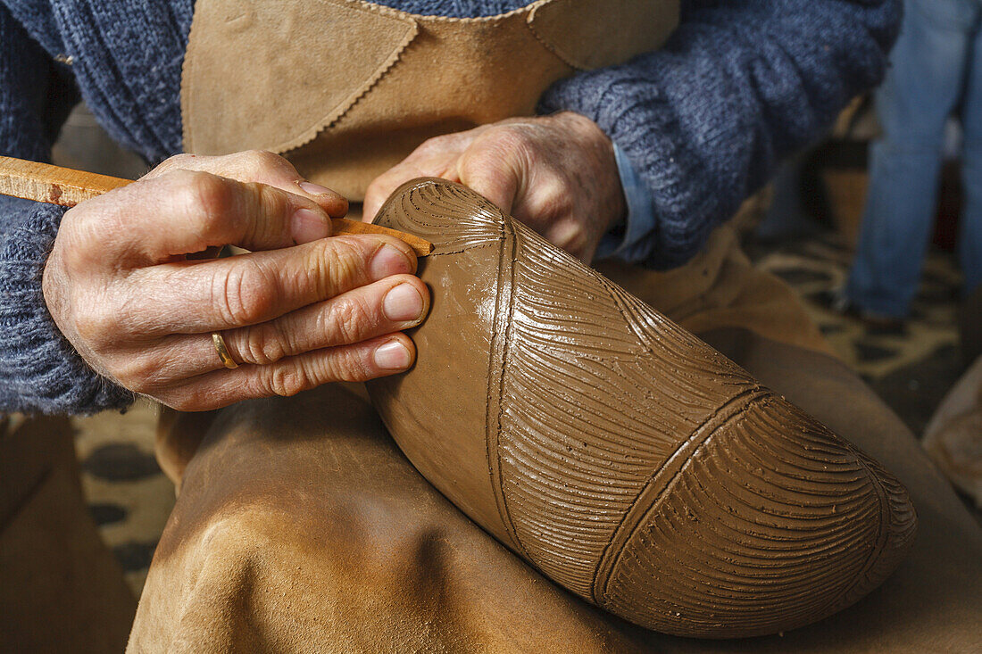Potter engraving a bowl, ceramic, pottery, workshop, Ramon Barreto Leal, Ceramica El Molino, Hoyo de Mazo, Villa de Mazo, La Palma, Canary Islands, Spain, Europe