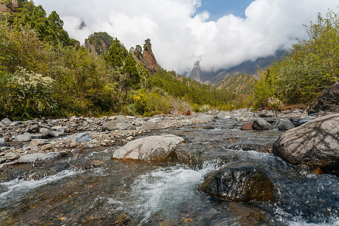 River flowing through mountainous landscape, Rio de Taburiente, Playa de Taburiente, volcanic rock formation, Roque Huso, National Parc, Parque Nacional Caldera de Taburiente, giant crater of extinct volcano, Caldera de Taburiente, natural preserve, UNESC