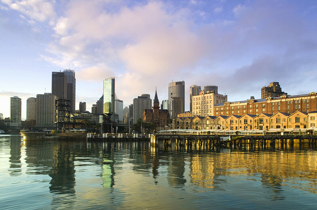 Australia - New South Wales (NSW) - Sydney: City Skyline and The Rocks historic area at sunrise