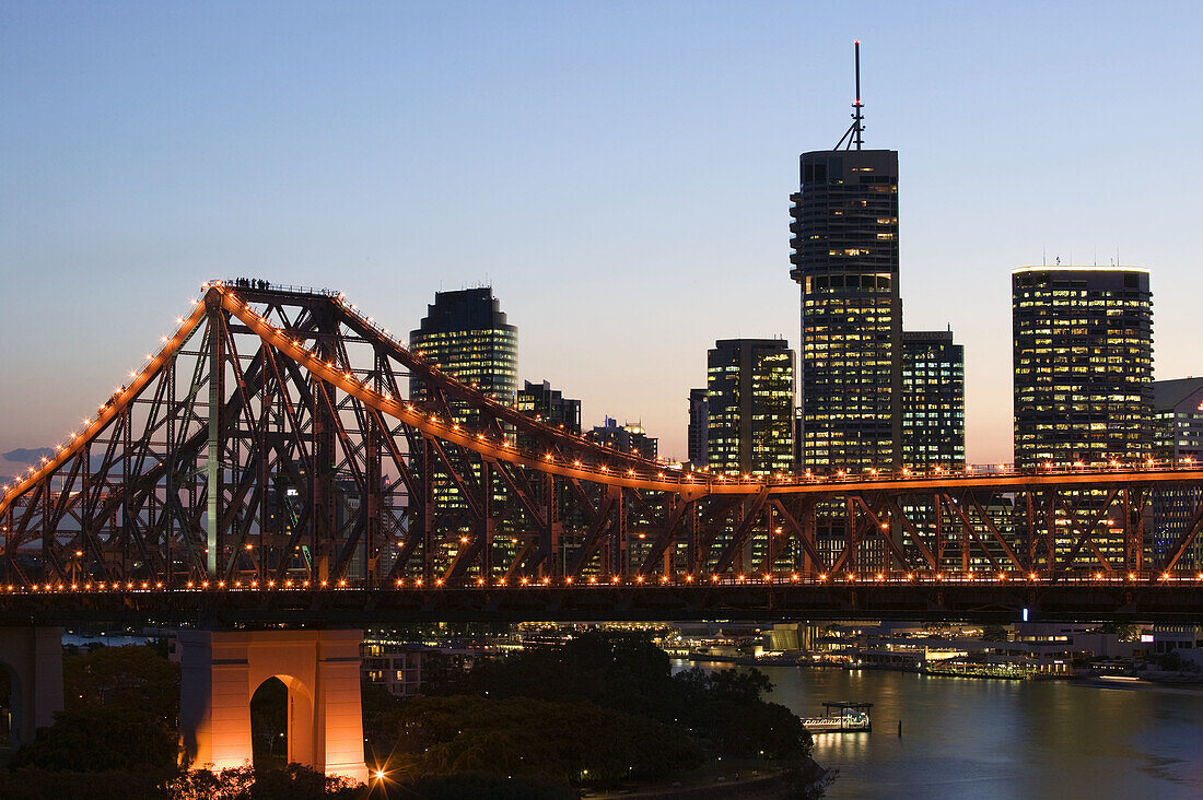 AUSTRALIA - Queensland - Brisbane: Evening view of the Story Bridge with Riverside Centre Highrises