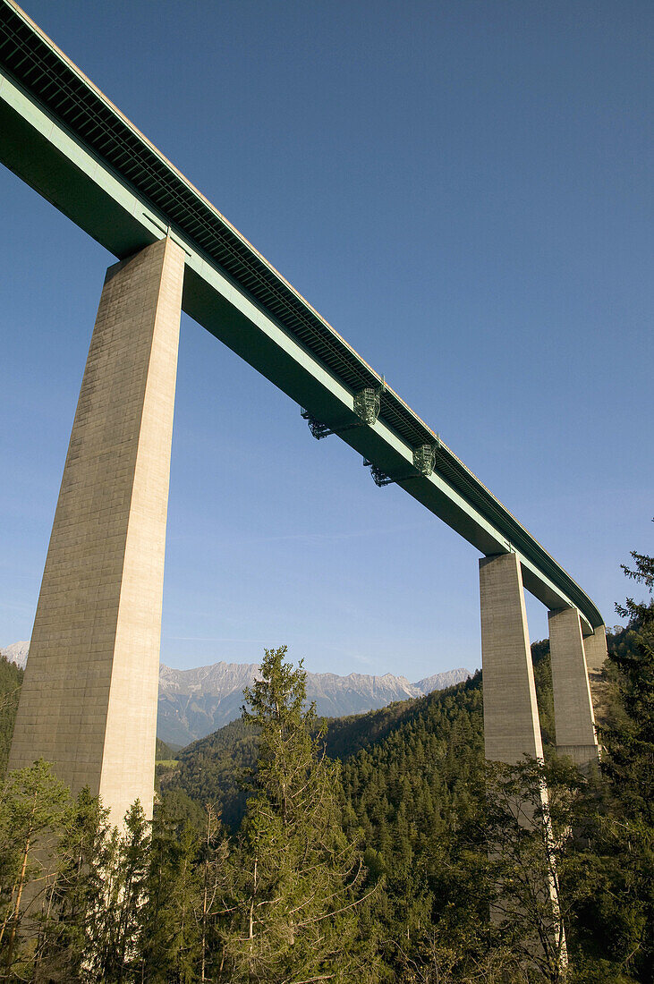 Austria,  Tyrol.  Elevated portion of the A13 autobahn high above highway 182 in the Tyrolean Alps.