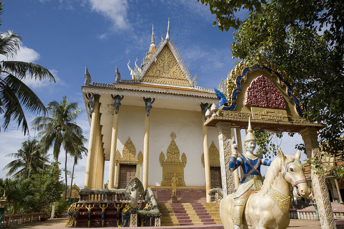 Temple with sculptures in the sunlight, Phnom Penh, Cambodia, Asia