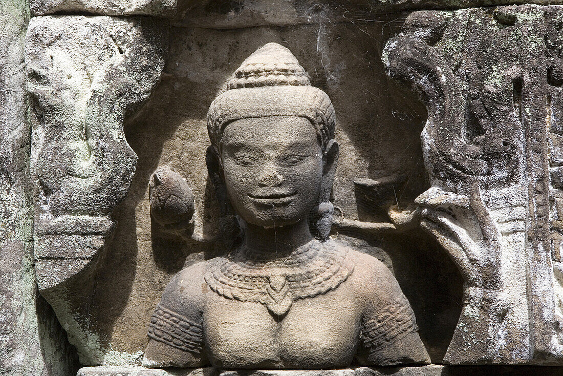 Buddhistic stone figure at the Bayon Temple at Angkor, Siem Reap Province, Cambodia, Asia