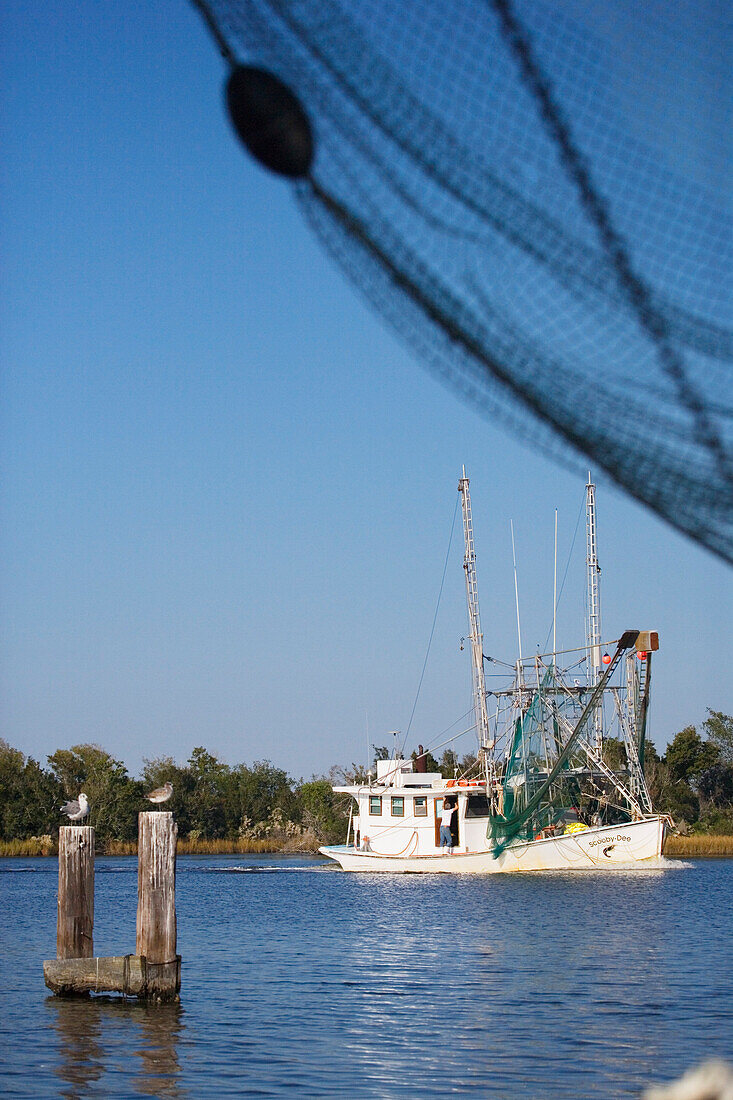 Fishing boat on a branch of the Mississippi river, south of New Orleans, Louisiana, USA