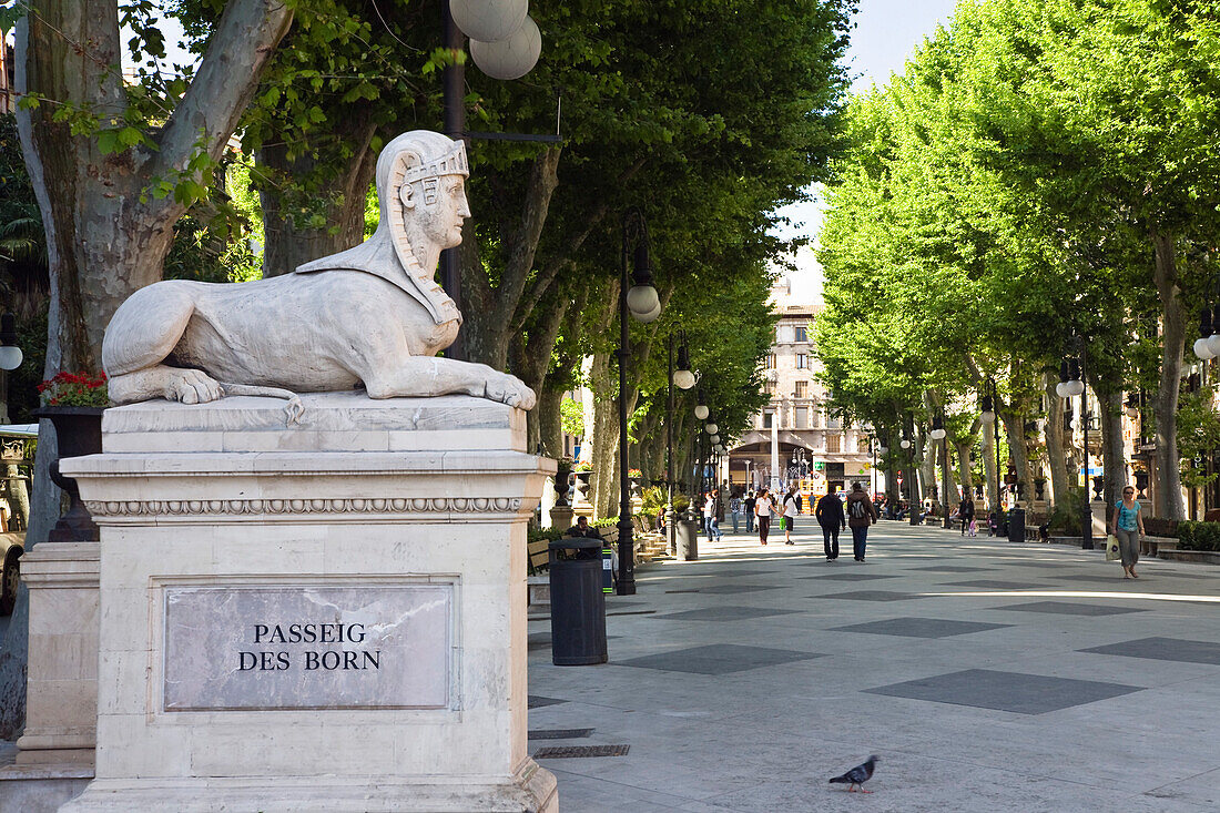 Sculpture and people on a promenade, Passeig des Born, Palma, Mallorca, Spain, Europe
