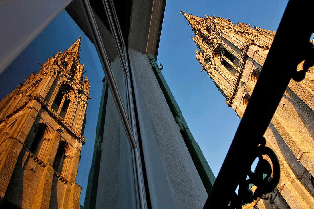 Reflection In The Windows Of The Bed Breakfast ?Le Parvis? Of The Old Gothic?Style Northern Tower Topped By A Flamboyant Spire From The 15Th Century, Notre-Dame De Chartres Cathedral, Eure-Et-Loir (28), France