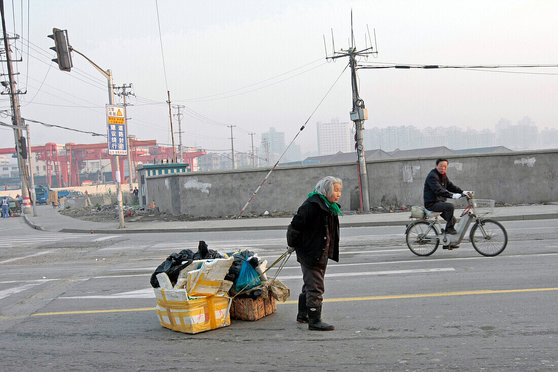 Elderly Person On A Road In The City Of Shanghai, China, Asia