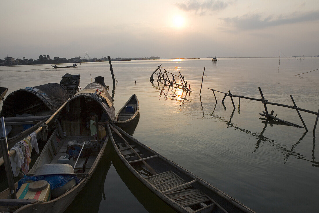 Fishing boats on the Thu Bon River at sunset, Quang Nam Province, Vietnam, Asia