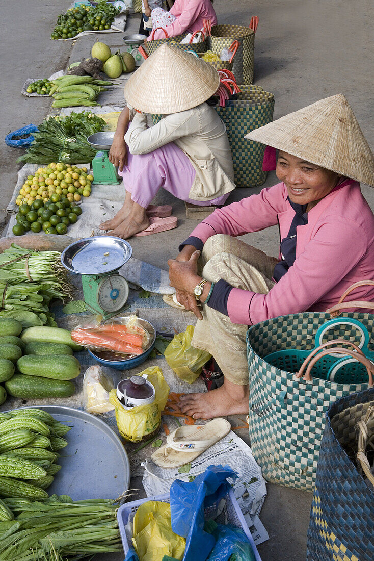 Vietnamese women at the market at Cai Rang, Mekong Delta, Can Tho Province, Vietnam, Asia