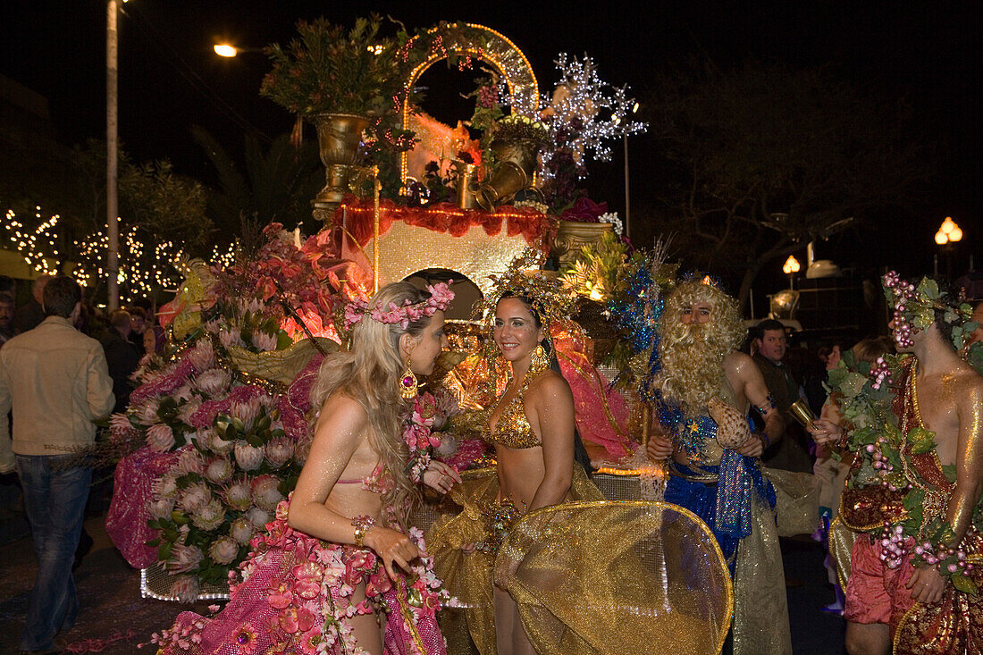 Young women in colourful costumes at the Carnival Parade, Funchal, Madeira, Portugal