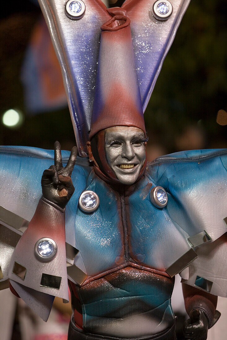Man in colourful space costume at the Carnival Parade, Funchal, Madeira, Portugal