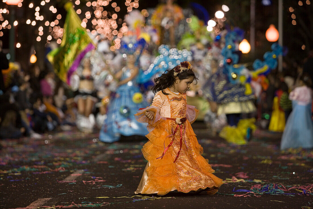 Young girl dancing at the Carnival Parade, Funchal, Madeira, Portugal