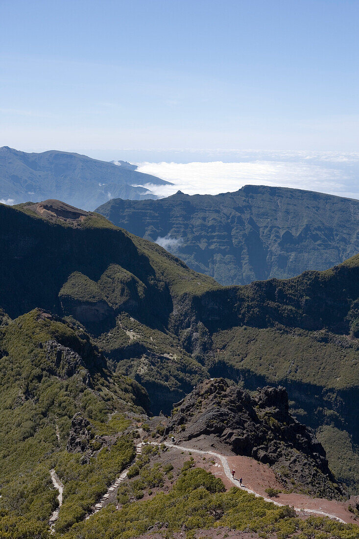 Hikers on Walking Track to Encumeada seen from Pico Ruivo Summit, Pico Ruivo, Madeira, Portugal