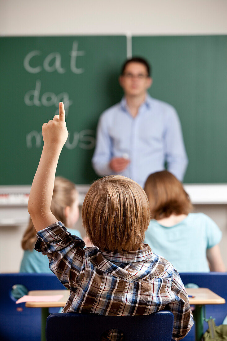 Pupils and teacher in classroom, Hamburg, Germany