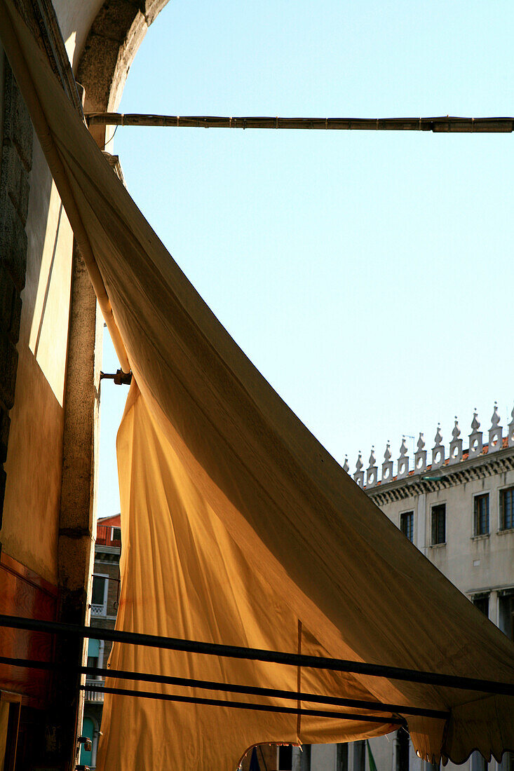 Canvas blind of a souvenir shop in the sunlight, Venice, Veneto, Italy, Europe