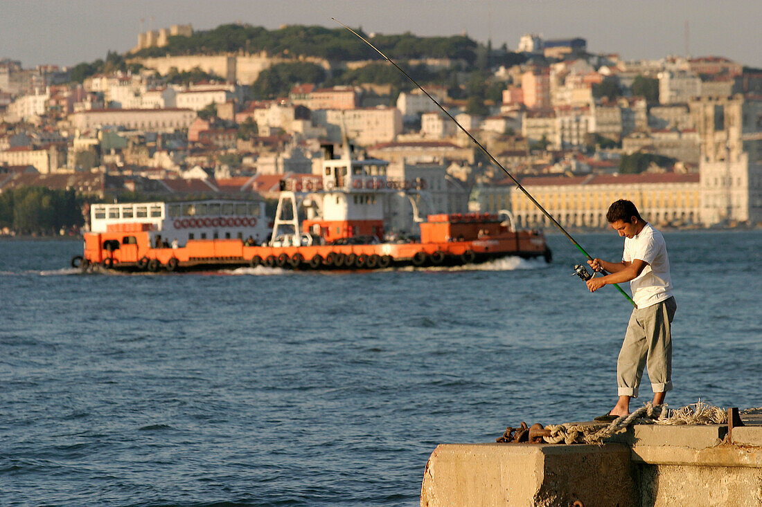 Fisherman, Cacilhas Across From Lisbon On The Other Bank Of The Tagus, Portugal