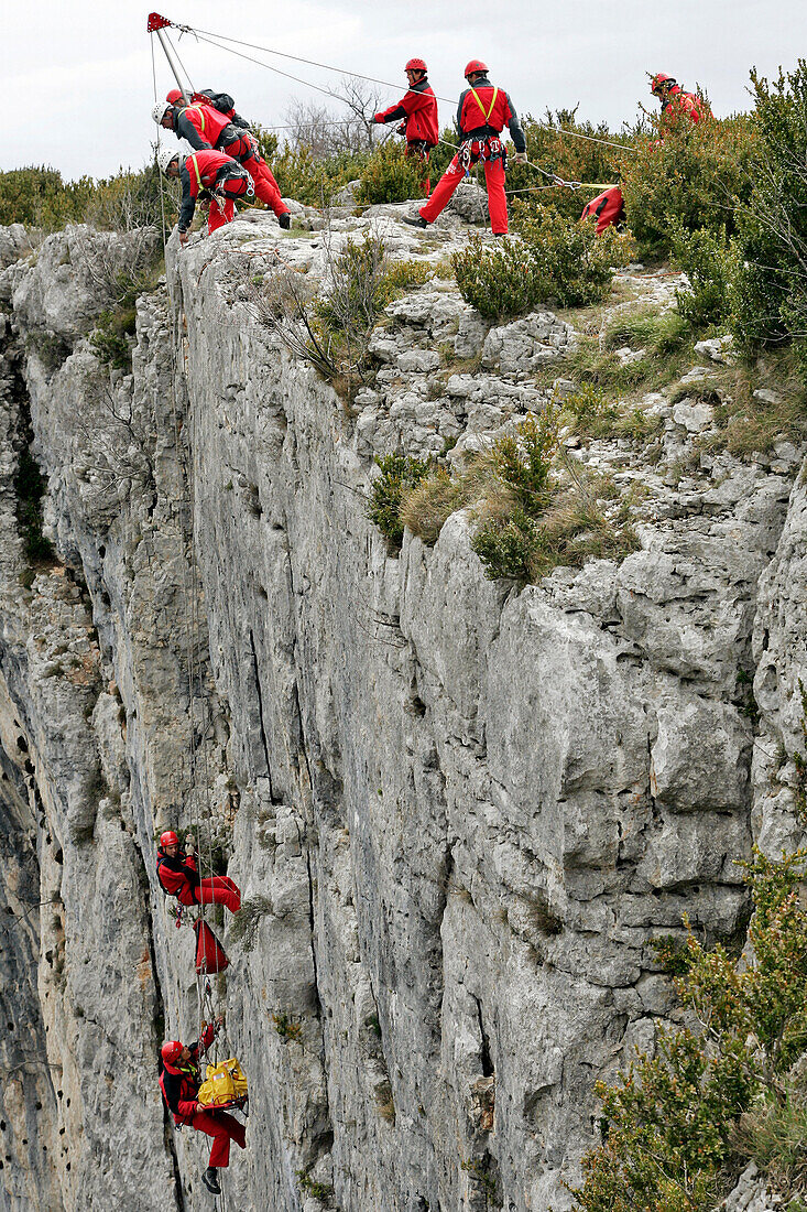 Firefighters In Action For Evacuation Of A Victim Of A Rock-Climbing Accident With A Mat Konk And Winch, Cliff Rescue In The Gorges Of The Verdon With The Search And Intervention In Dangerous Places Group Of The Var Fire Department, Les Cavaliers, Var (83