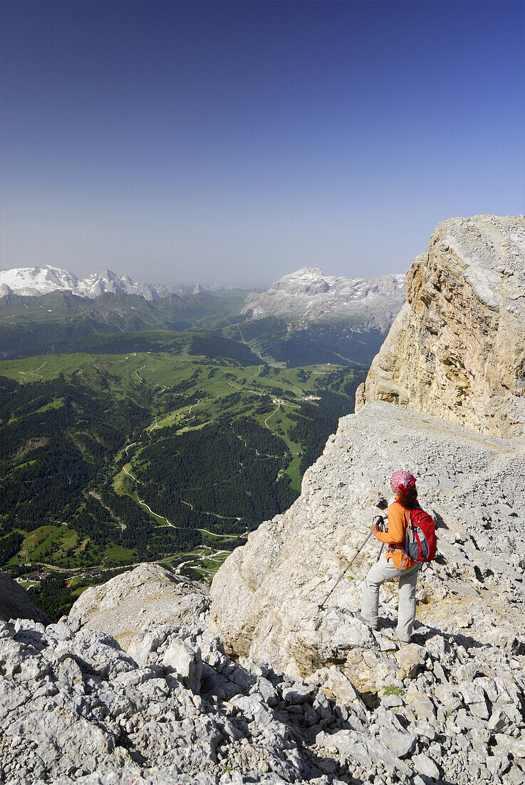 Woman enjoying view from La Varella to Marmolada and Piz Boe, Naturpark Fanes-Sennes-Prags, Dolomites, Trentino-Alto Adige/South Tyrol, Italy