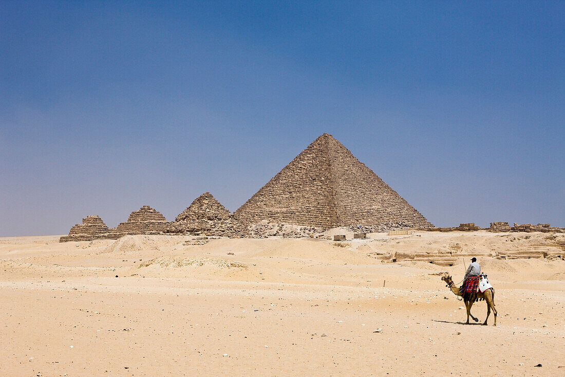 Pyramid of Menkaure and three small Pyramids of Queens, Egypt, Cairo