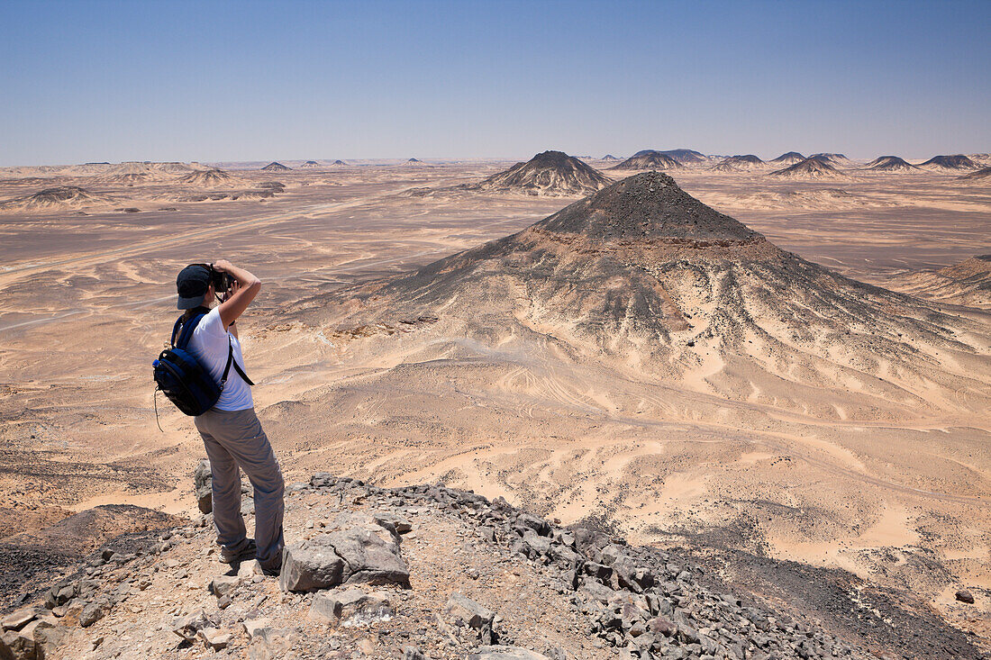 Tourist at Black Desert, Egypt, Libyan Desert