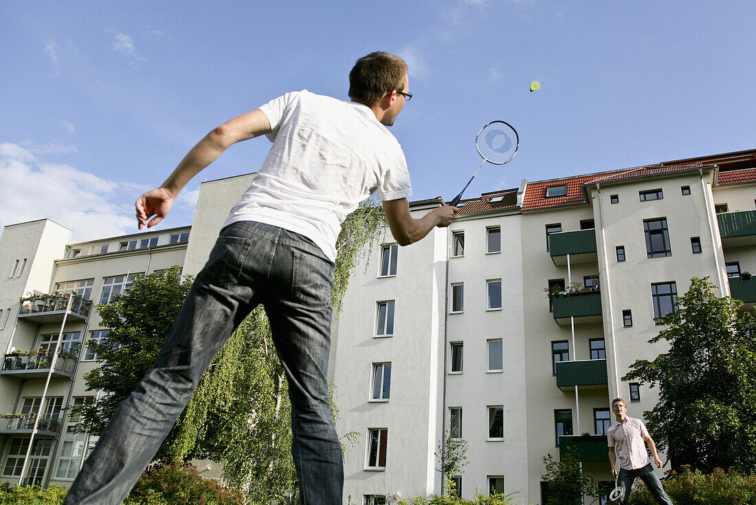 Two men playing badminton, Leipzig, Saxony, Germany