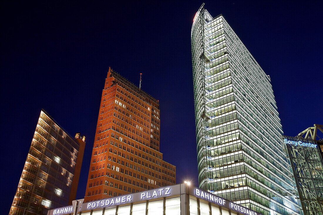 Buildings On The Potsdamer Platz, Price Waterhouse Coopers (Architect: Renzo Piano), The 25 Story Skyscraper In Brick And Granite Created By The German Hans Kollhoff (1999), And The Db Tower Sony Center (Architect: Helmut Jahn). Berlin, Germany