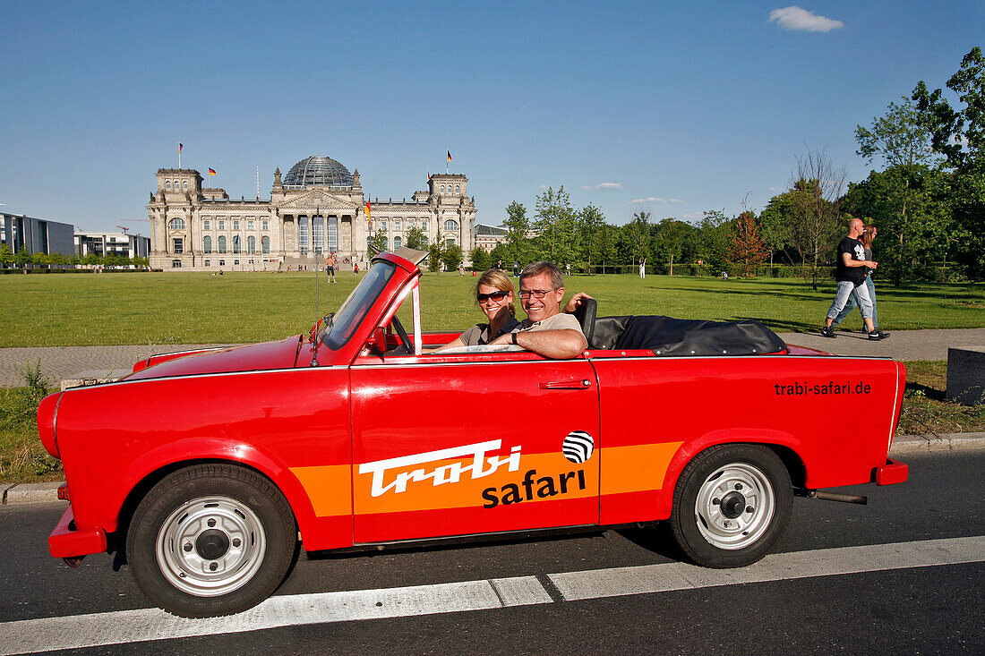 Couple Touring Berlin In A Trabant, The Family Car Of The Ex-Ddr Become A Cult Symbol Of East Germany, Trabi Safari, In Front Of The German Parliament, Reichstag, German Bundestag, Berlin, Germany