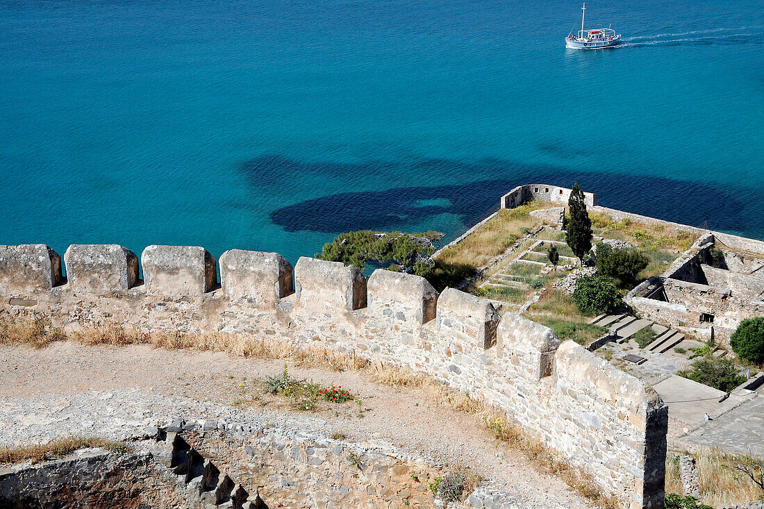 Venetian Fortress On The Isle Of Spinalonga And Boat In The Gulf Of Mirabello, Crete, Greece