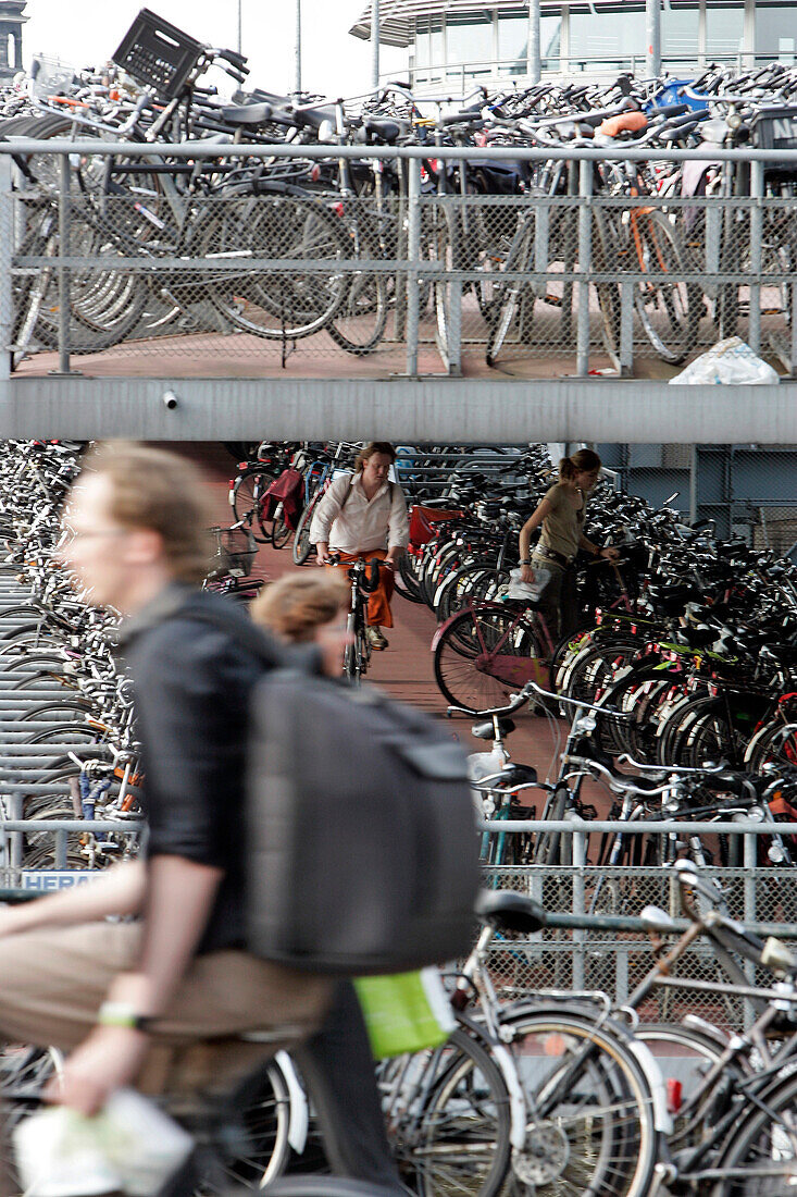 Bikes In Front Of The Big Bicycle Parking Lot At The Main Train Station, Amsterdam, Netherlands