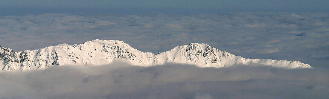 View Of Mountain Summits Rising Above The Clouds In The Pyrenees National Park, Gourette (64), France