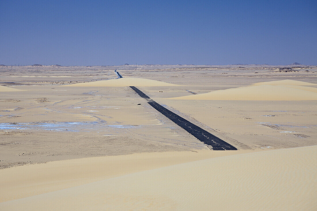 Drifting Sand Dunes crossing Street, Libyan Desert, Egypt