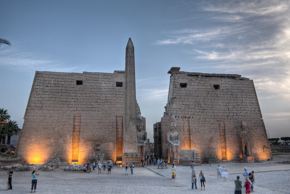 Illuminated Entrance of Luxor Temple with Ramesses II Statue and Obelisk, Luxor, Egypt