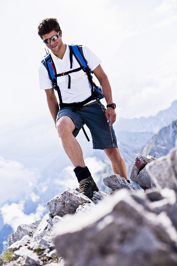 Man hiking on Rumer Spitze, Innsbruck, Karwendel range, Tyrol, Austria